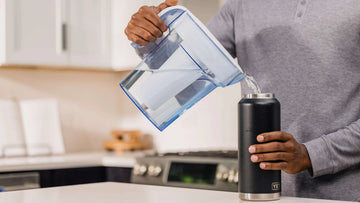 Pouring from a ZeroWater Filter Jug into a bottle